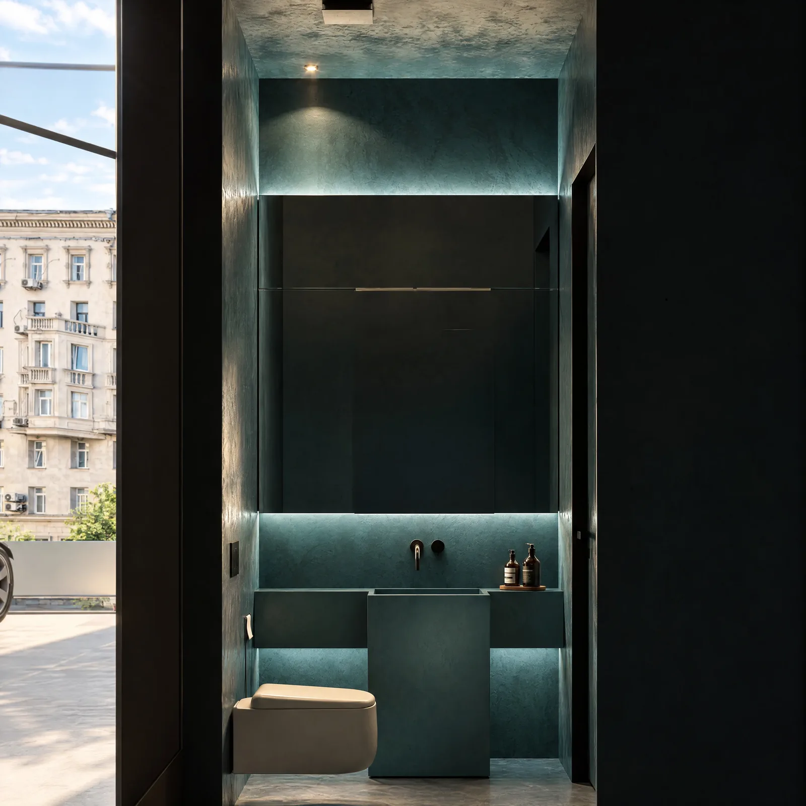 Moto Xperts — Washroom in teal plaster
