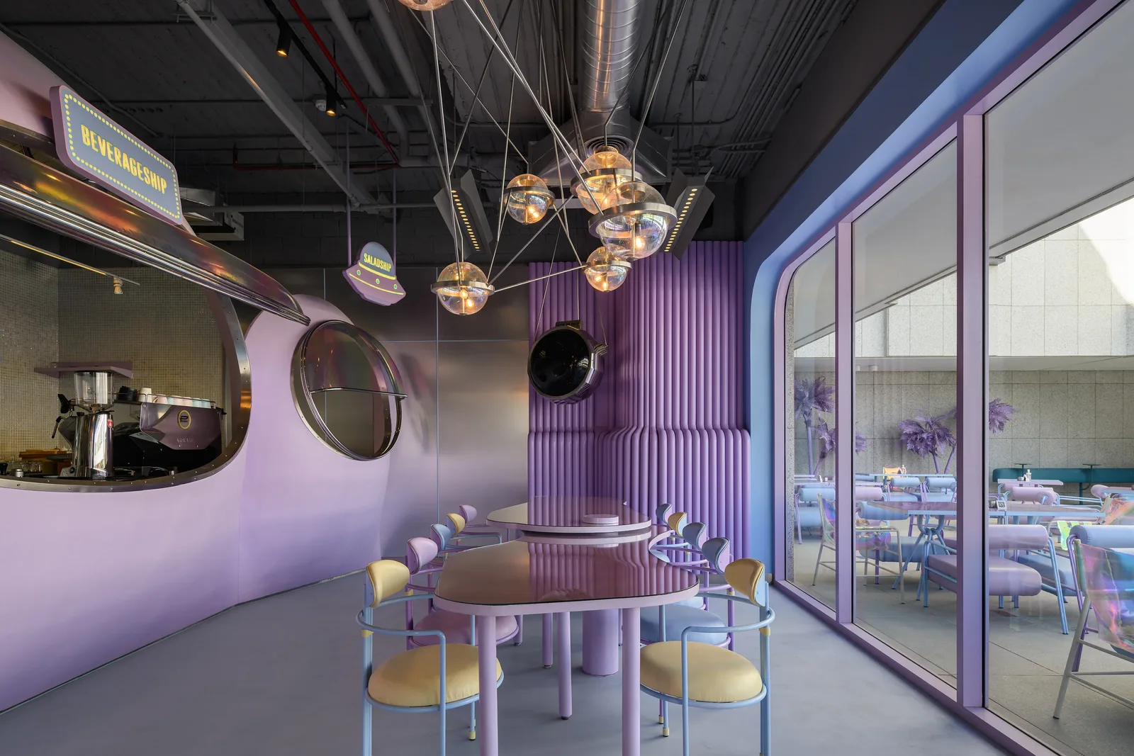 Talkback — Dining room with elliptical windows and glass pendants