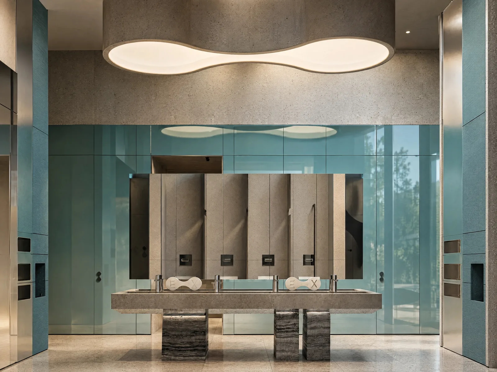 Exon Gym — Vanities beneath a sculpted light