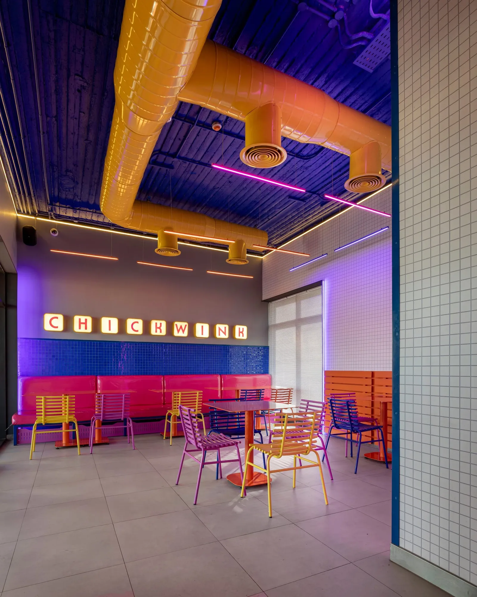 Chick Wink — Dining room beneath yellow ducts