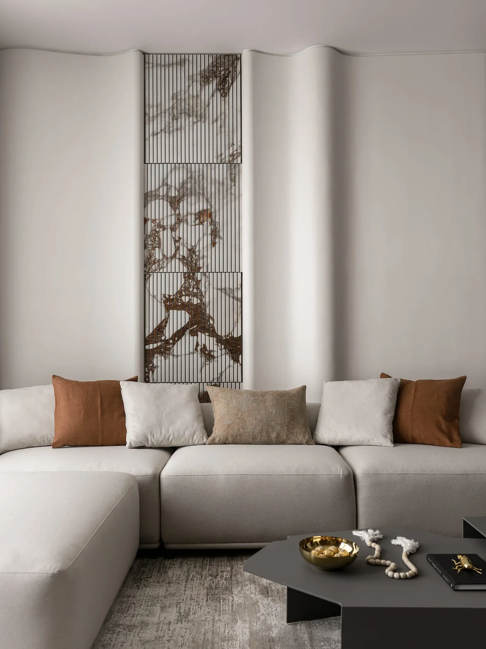 JW Marriott Residences — Sofa and dark sculptural coffee tables