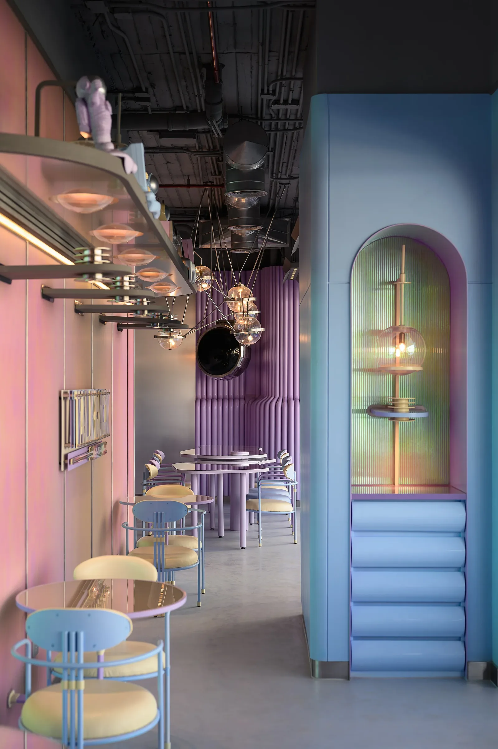 Talkback — Arched niche and tubular metal chairs