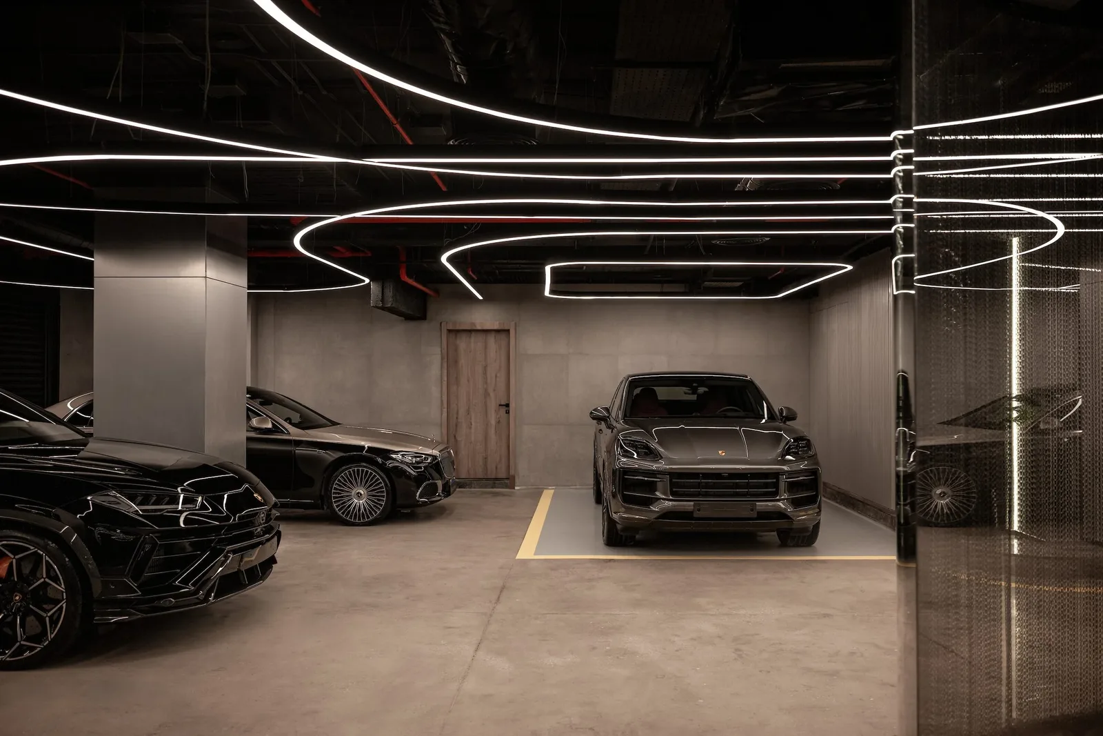 Attafy — Lower-level garage with lines of light