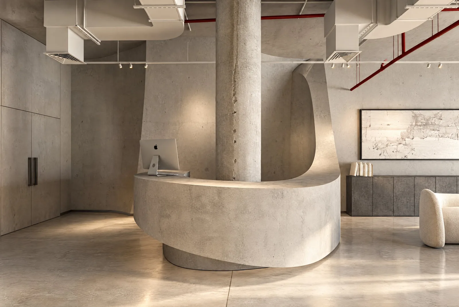 Lure Galarie — Reception with a sculpted plaster column and curved desk