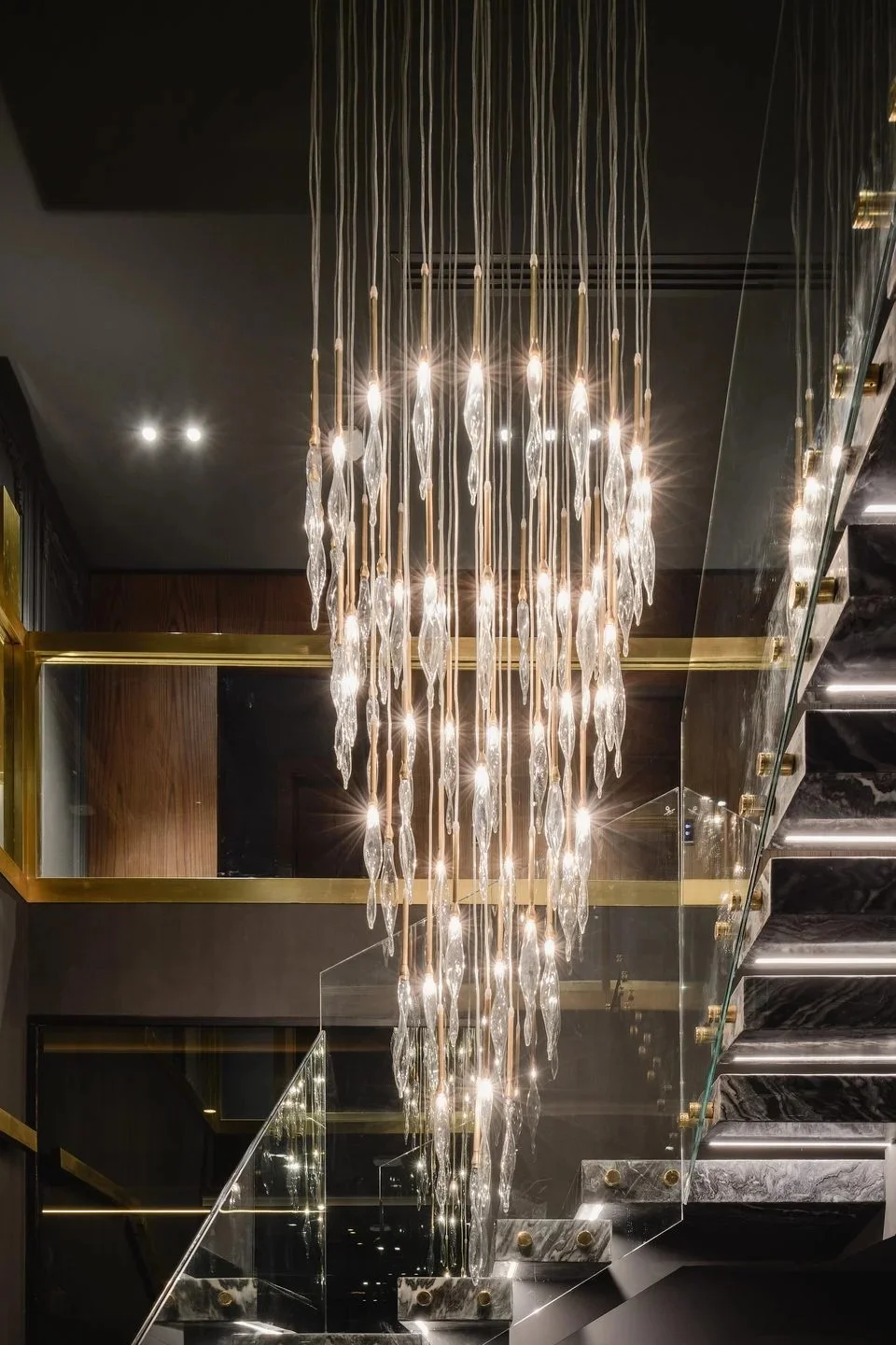 Cascade chandelier in hand-strung crystal
