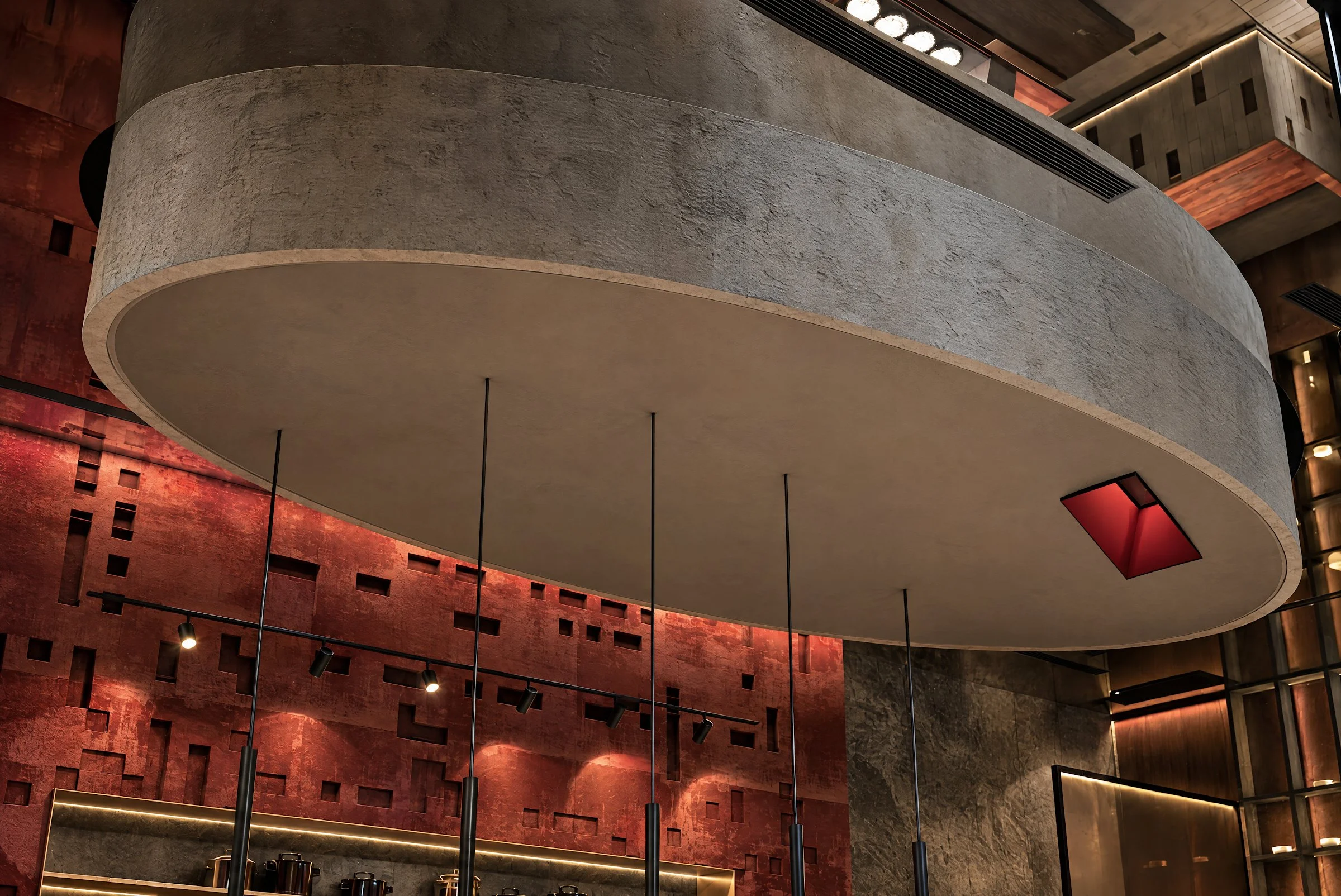 Sushimi By K — Sculpted ceiling disc above the dining room