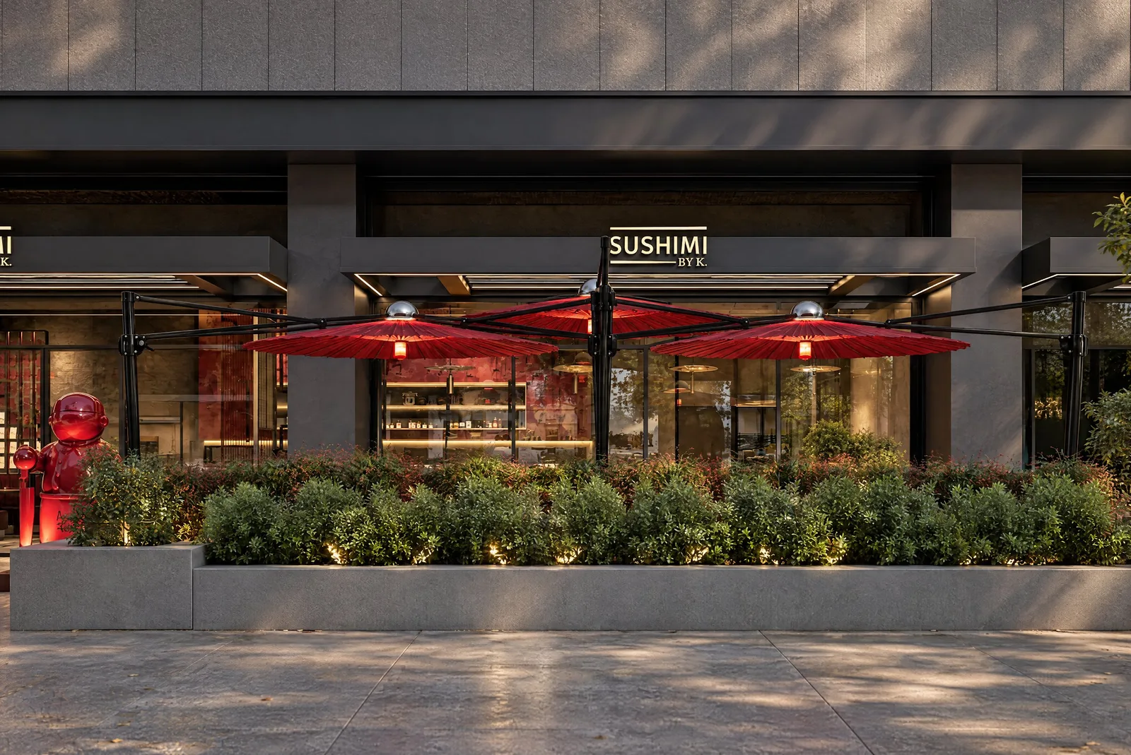 Sushimi By K — Street view of the terrace and red parasols